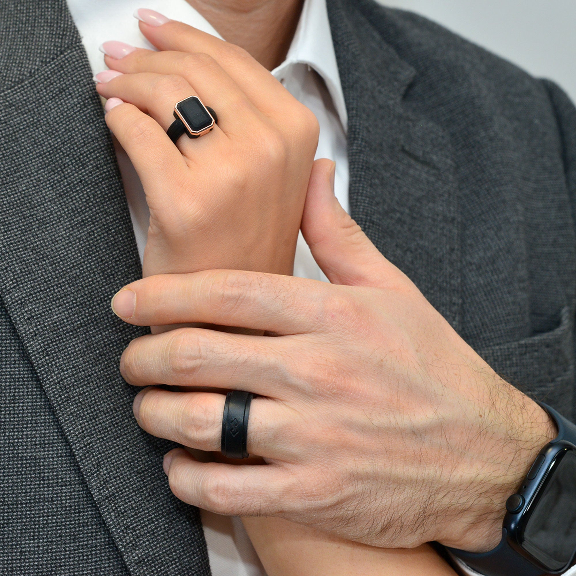 Set of Two Rings: Women's Black Emerald  & Men's Infinity Collection